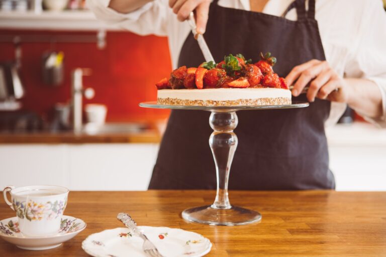 woman-cutting-strawberry-cake.jpg